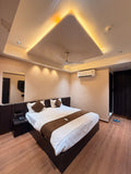 Hotel Presidency Deluxe King Room in surat